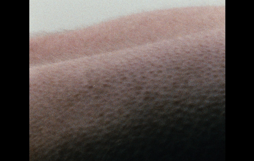 Egomania. Island without Hope: more extreme working conditions: a shot of the body of the actor Volker Bertzky showing how the conditions make it into the film