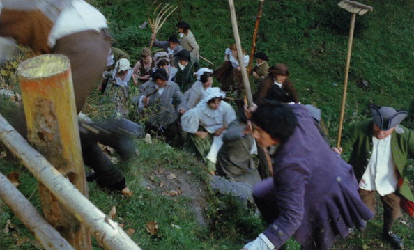 The crowd storms the castle in Mark of the Devil