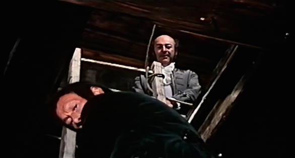 Elisabeth’s interrogation through a hatch in the floor in Mark of the Devil Part II